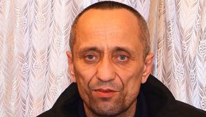 Retrato policial de Mijaíl Popkov (Fuente: Archivo de la Policía de Irkutsk)